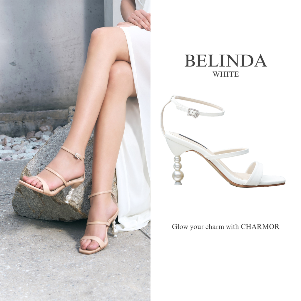 Model wearing The Belinda pearl heels in white