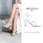 Model wearing The Belinda pearl heels in white