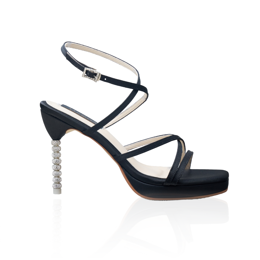 The Cara cross-strap heels with a crystal-embellished 4-inch heel, in black