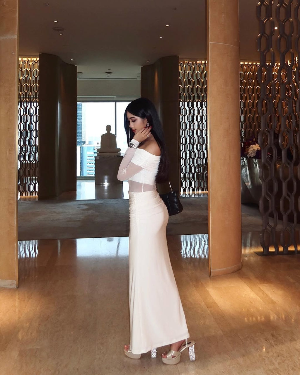 Model wearing The Glamour platform sandals