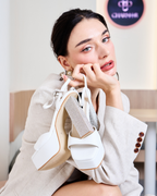 Model wearing The Grace platform heels