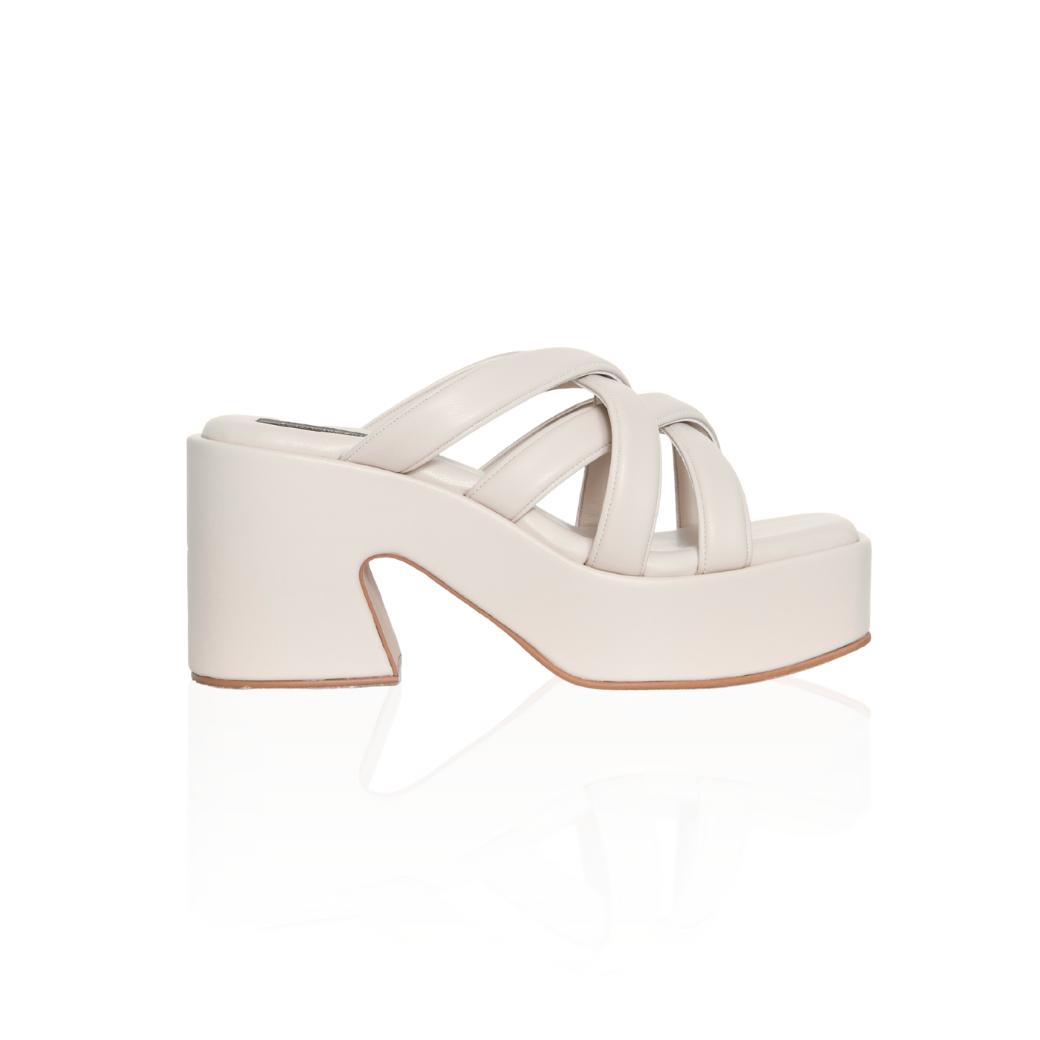 The Miguel cross-strap platform sandals with a 3.5-inch block heel, in ivory