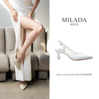 Model wearing The Milada pearl slingback heels in white