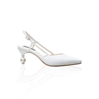 The Milada pearl slingback heels with a pointed toe and 3-inch heel, in white