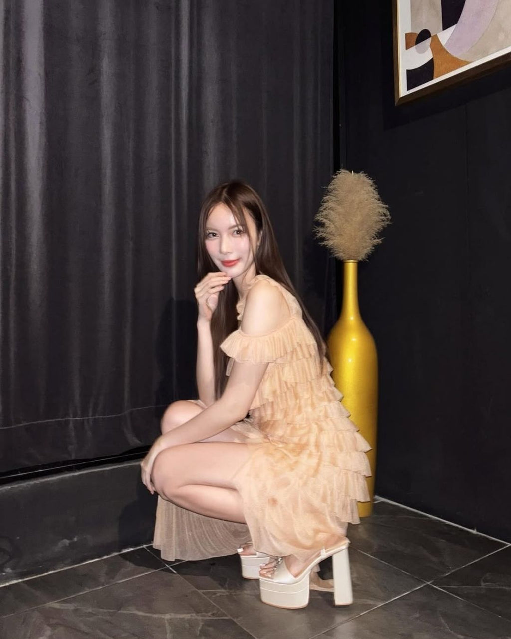 Model wearing The Stella Bow double-platform heels