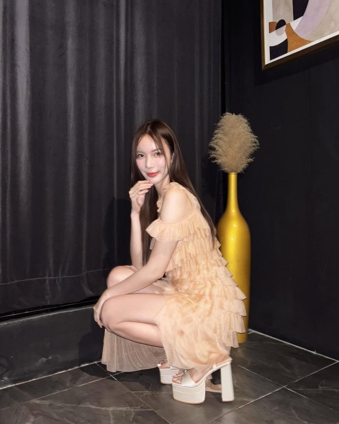 Model wearing The Stella Bow double-platform heels
