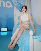 Model wearing The Victoria cross-strap pageant platform heels