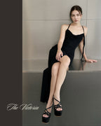 Model wearing The Victoria cross-strap pageant platform heels
